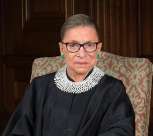 A headshot photo of Justice Ruth Bader Ginsberg looking seriously at the camera