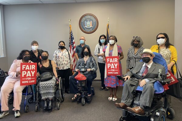 Advocates and Majority Leader pose for photo